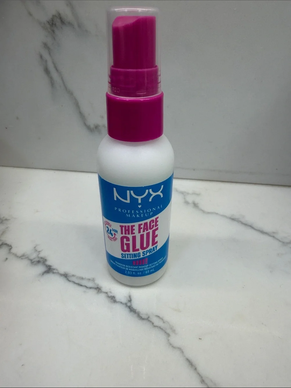 NYX The Face Glue Setting Spray — Pink & Blue Bottle